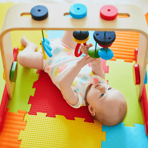 Baby on foam play mats