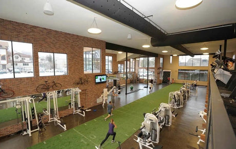 Indoor Green Turf Sprint Track: Boost Gym Workouts with Sled and Sprint Training